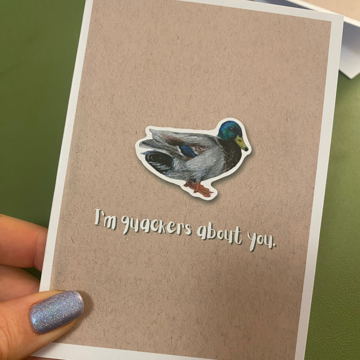 cute pun ainimal greetings card with duck saying "I'm quackers about you" for Valentine's day