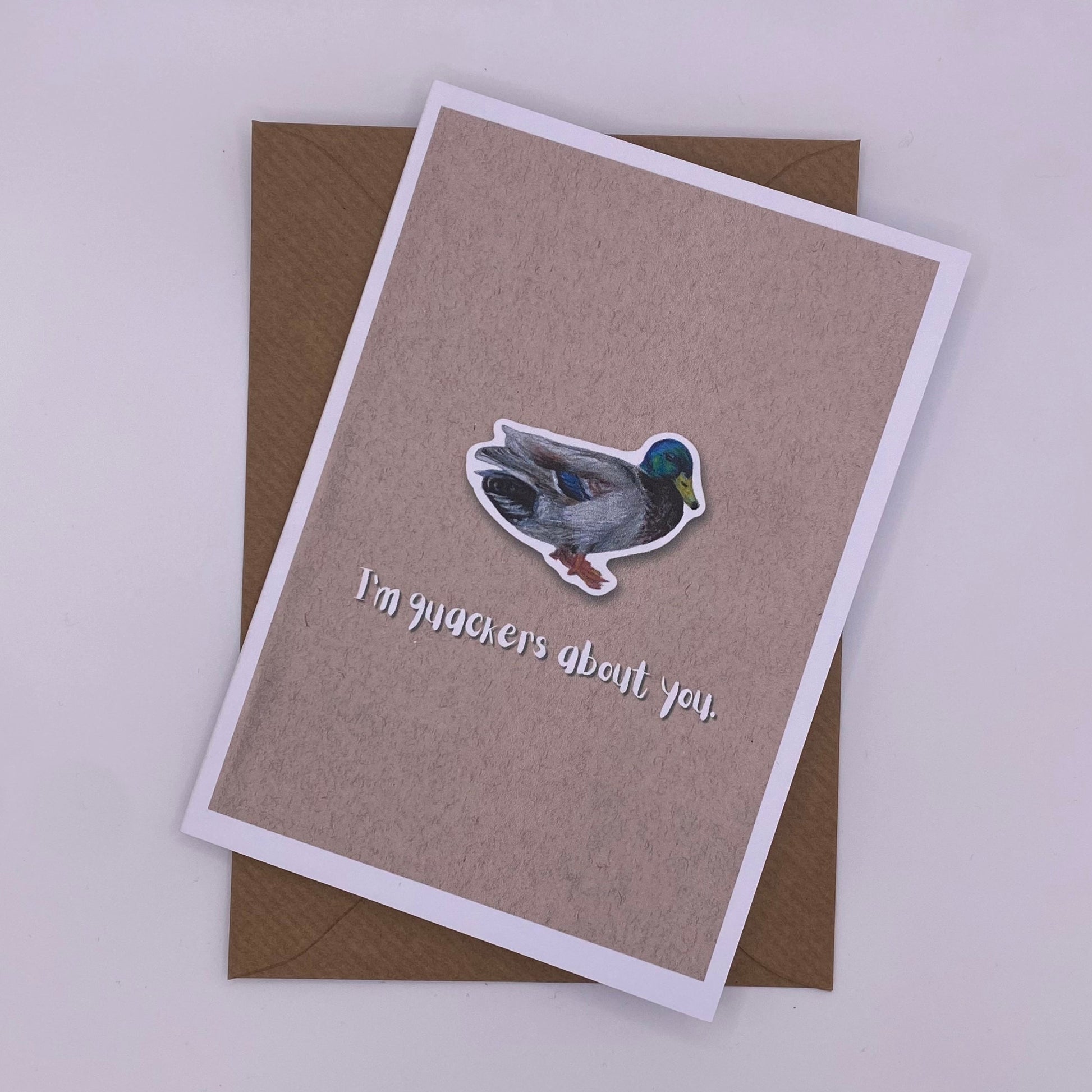 cute pun ainimal greetings card with duck saying "I'm quackers about you" for Valentine's day