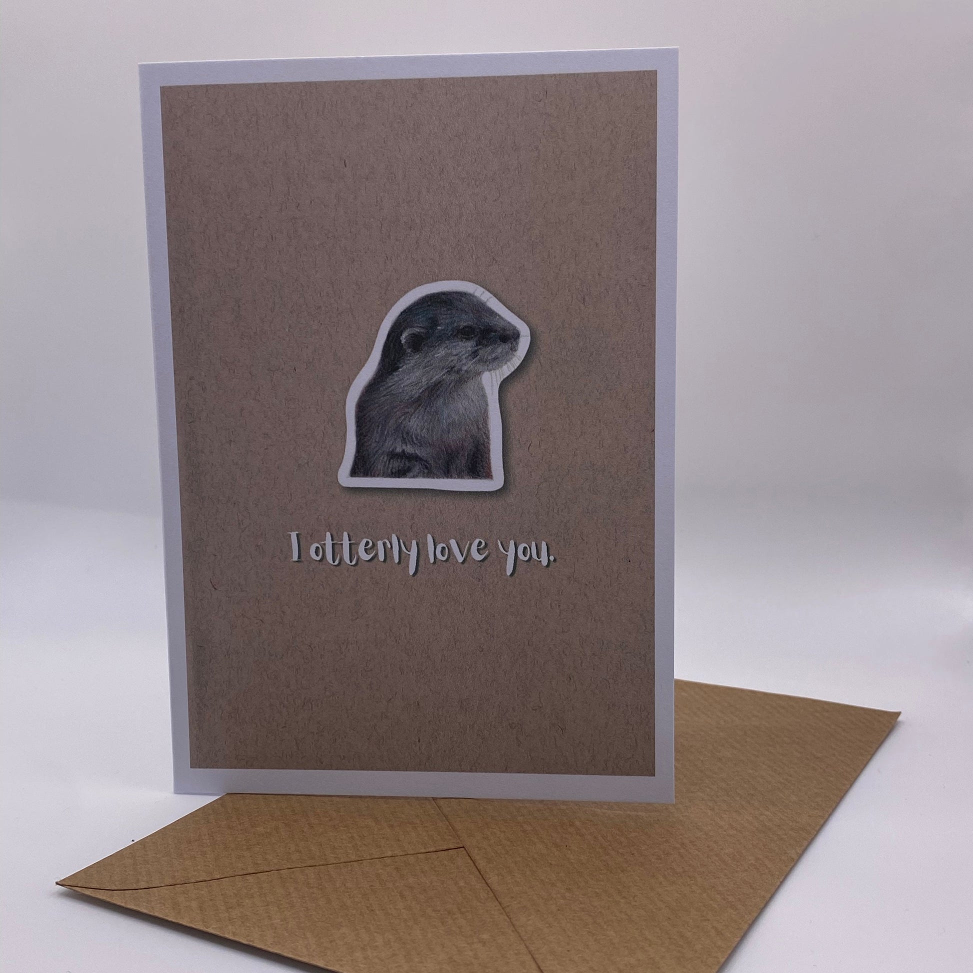cute pun ainimal greetings card with otter saying "I otterly love you" for Valentine's day