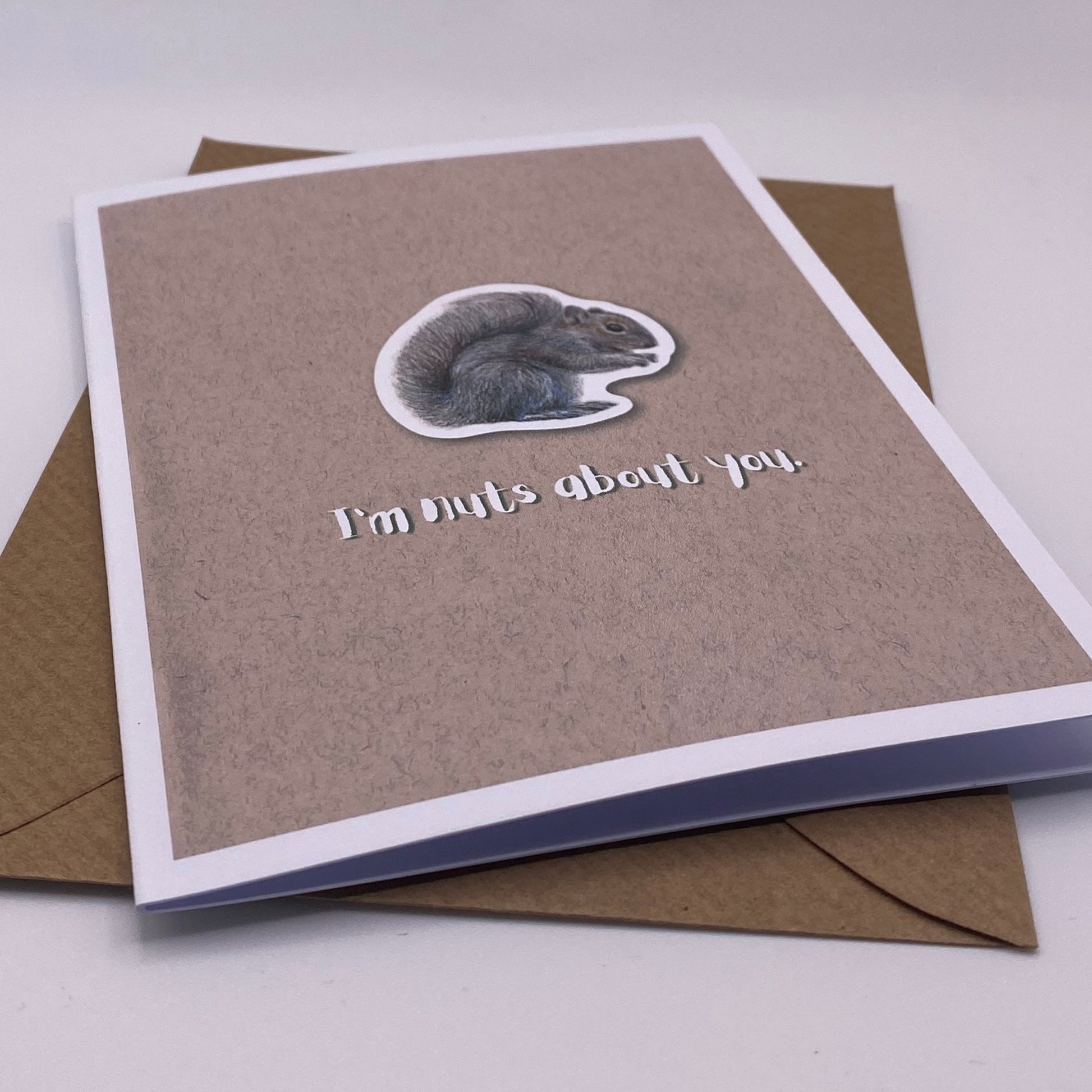 cute pun ainimal greetings card with squirrel saying "I'm nuts about you" for Valentine's day