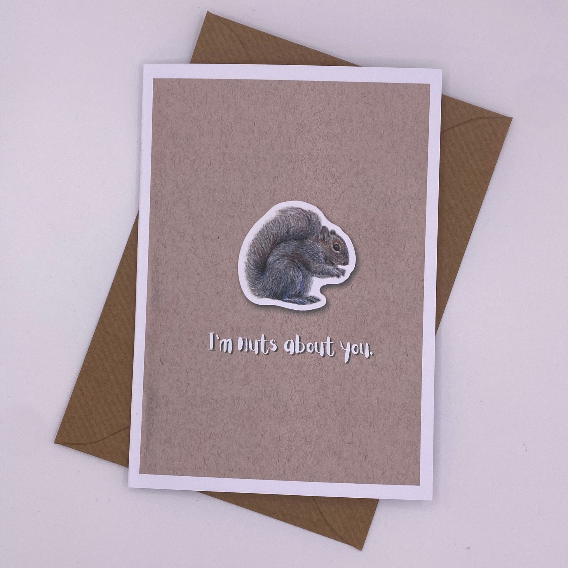 cute pun ainimal greetings card with squirrel saying "I'm nuts about you" for Valentine's day